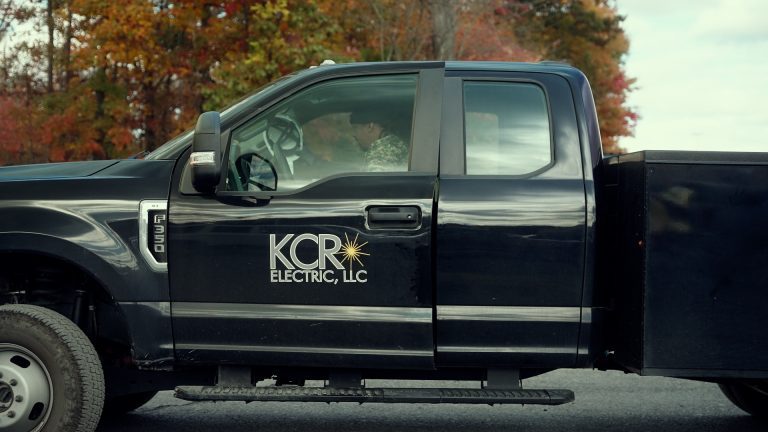 KCR Electric LLC on the side of a black truck